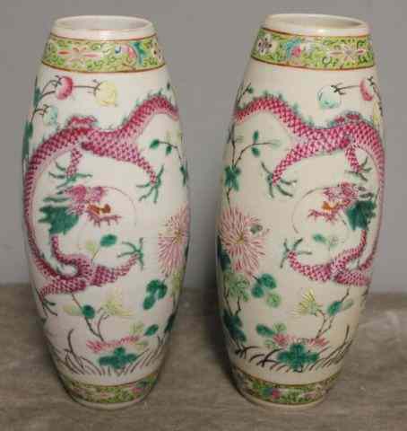 Appraisal: Pair of Antique Famille Rose Vases with EnamelDecoration Including Dragons