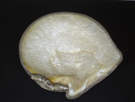 Appraisal: A th century silver mounted carved mother of pearl dish