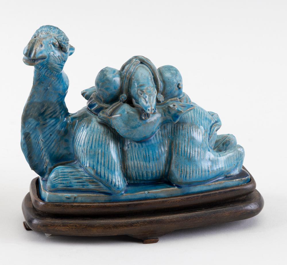 Appraisal: CHINESE BLUE GLAZE PORCELAIN SEATED CAMEL FIGURE POSSIBLY KANGXI PERIOD