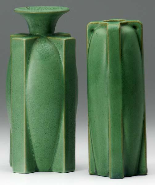 Appraisal: TECO Two buttressed vases covered in smooth matte green glaze