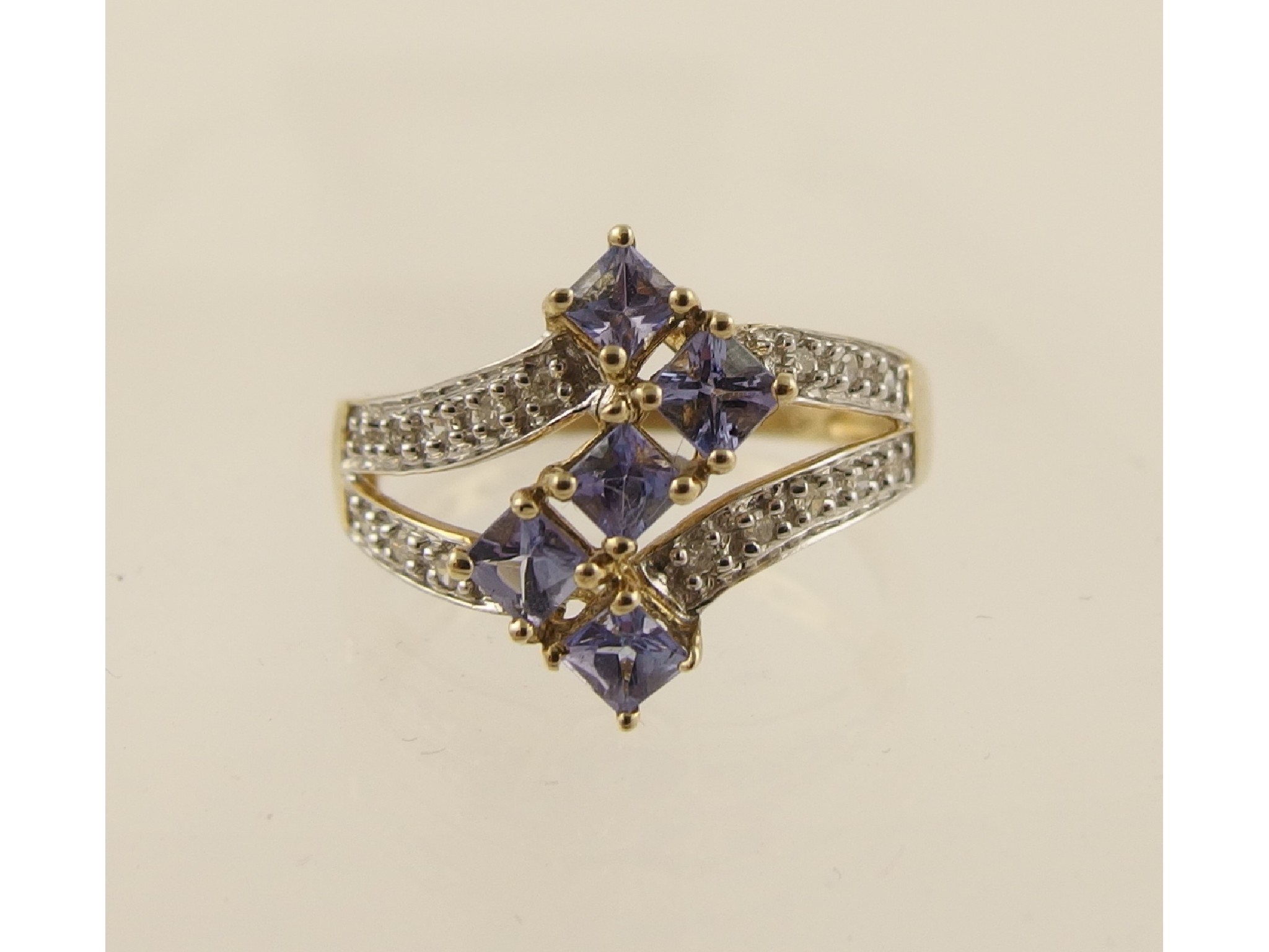 Appraisal: A ct tanzanite and diamond dress ring