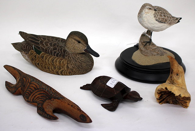 Appraisal: A CARVED WOOD AND HAND PAINTED MODEL of a duck