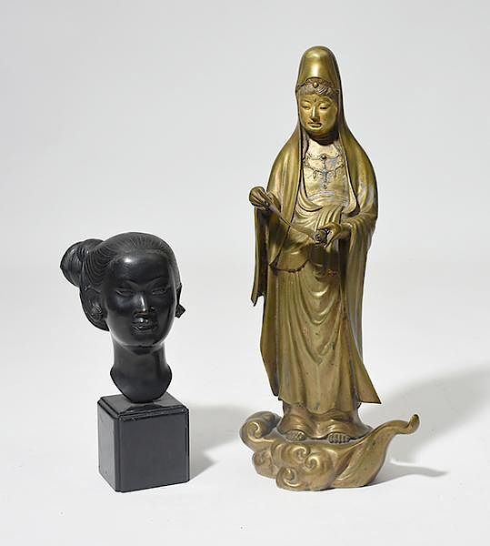 Appraisal: Two Asian bronzes Two Asian bronzes gilt example figure reading