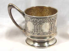 Appraisal: A Russian silver tea glass holder with art nouveau decoration