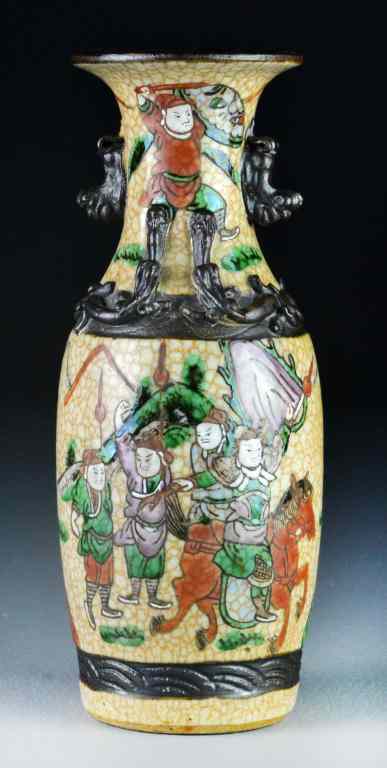 Appraisal: Chinese Enamelled Figural VaseBaluster-shaped vase with two animal head metallic-glazed