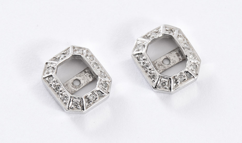 Appraisal: K DIAMOND EARRING JACKETS K white gold earring jackets contain