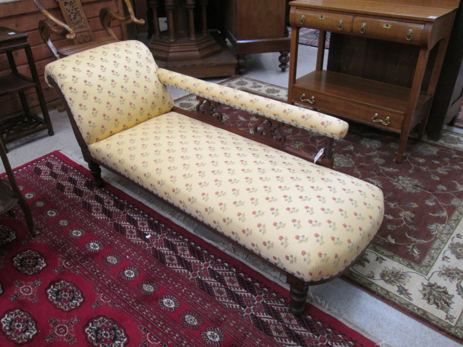 Appraisal: VICTORIAN CARVED AND UPHOLSTERED CHAISE LONGUE English late th century