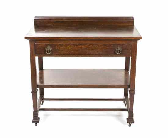 Appraisal: An Arts Crafts Style Oak Server the rectangular top over