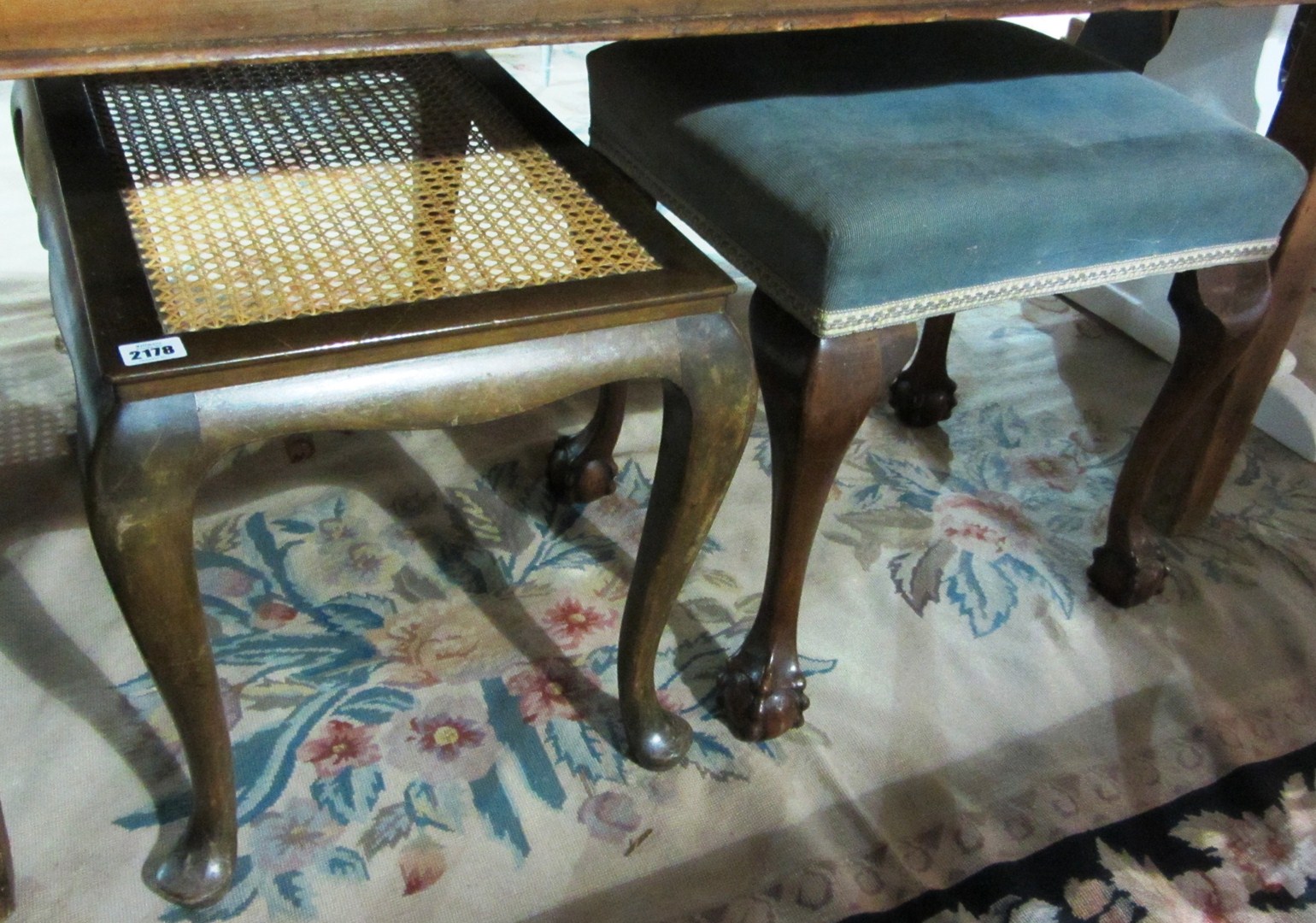 Appraisal: A mahogany framed footstool and a walnut framed footstool