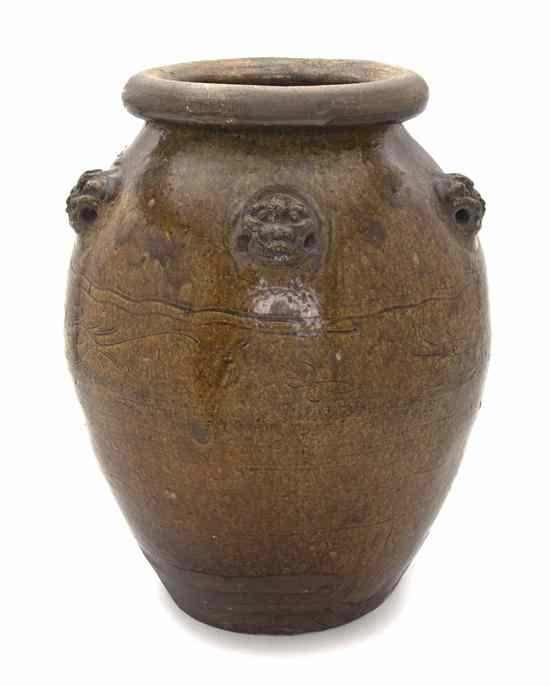 Appraisal: A Guangdong Province Ceramic Jar of bulbous form with four