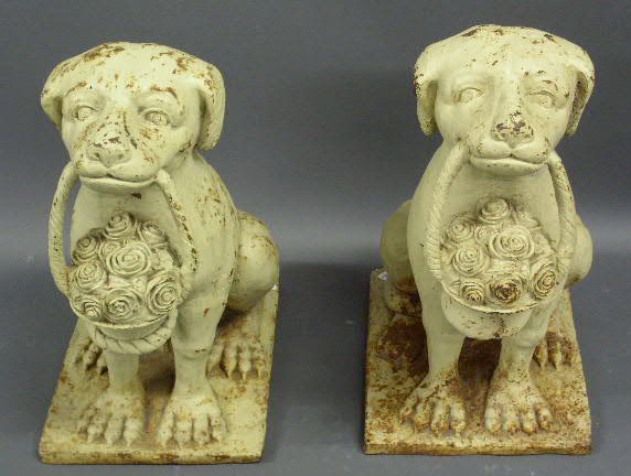 Appraisal: Pair of cast iron garden statuary dogs thc h x