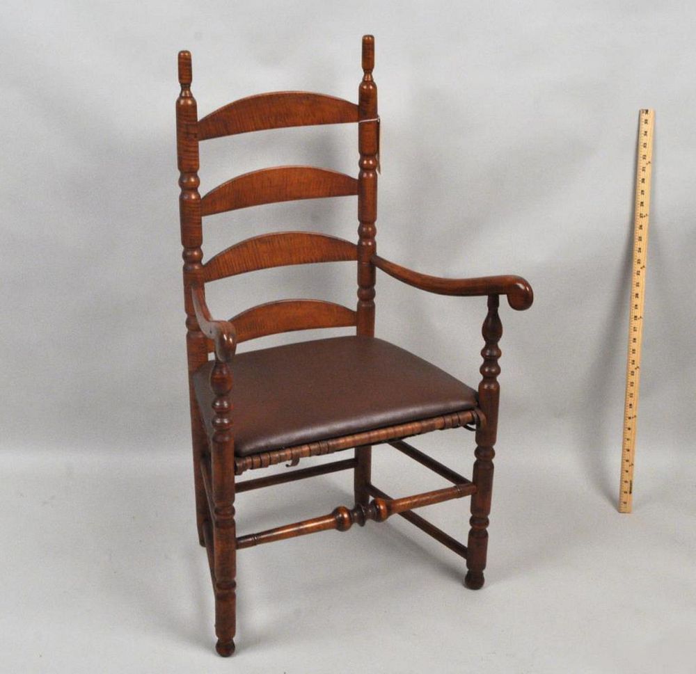 Appraisal: American Country Tiger Maple Ladderback Arm Chair with elongated finials