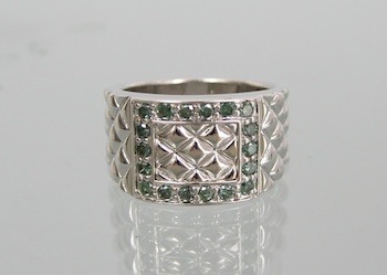 Appraisal: A Diamond and Sterling Silver Band A sterling silver cushion