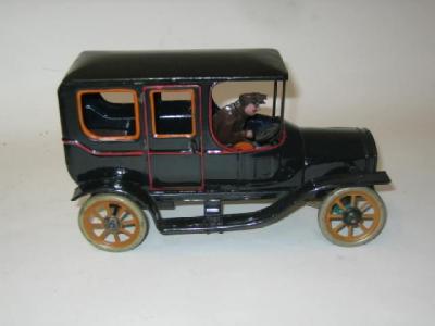 Appraisal: A German Limousine tinplate clockwork AF with driver repainted long