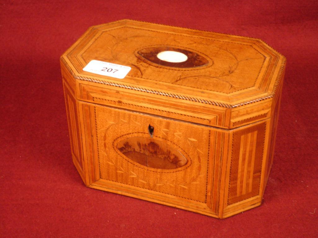 Appraisal: A George III Sheraton style tea caddy decorated with marquetry