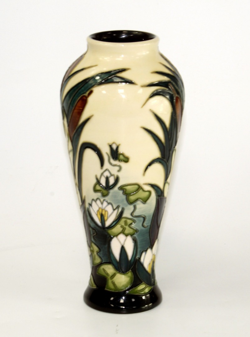 Appraisal: A Moorcroft pottery vase of baluster form decorated with water