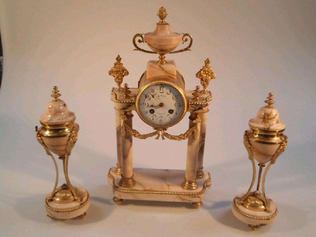 Appraisal: A thC French gilt metal and marble clock garniture of