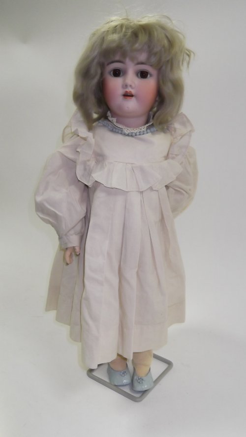 Appraisal: A German bisque head doll the head impressed Handwerck with