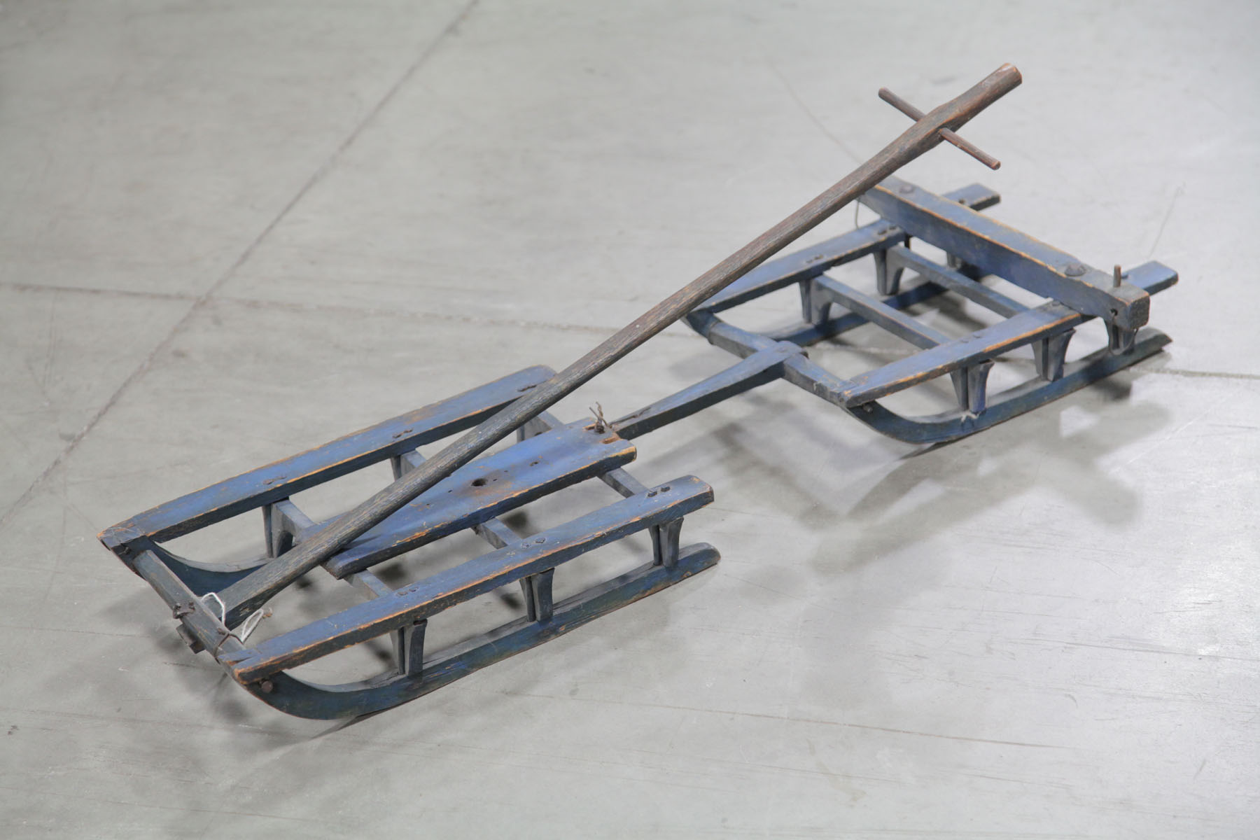 Appraisal: CHILD'S SLED American early th century Blue painted wooden sled