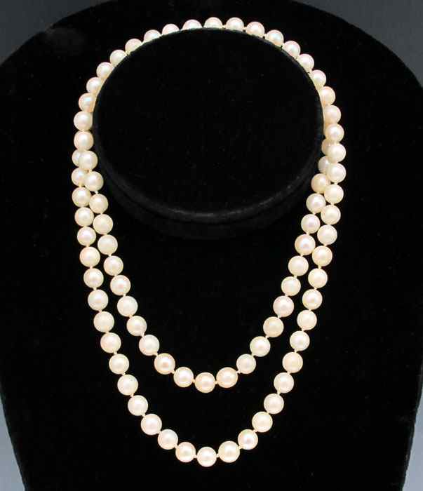 Appraisal: '' CONTINUOUS STRAND OF CULTURED PEARLS Strand of mm cultured