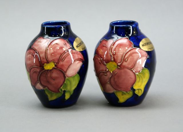 Appraisal: A pair of miniature vases decorated with the Clematis design