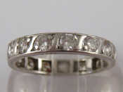 Appraisal: A white metal test carat gold diamond eternity ring approx