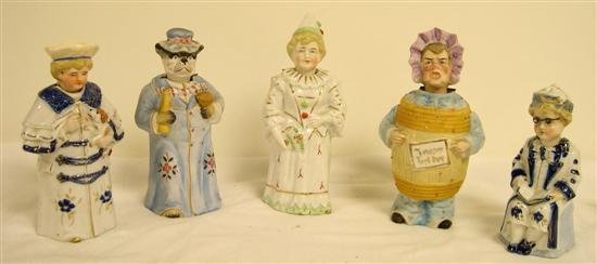 Appraisal: Five porcelain nodder figurines including an adult man in a