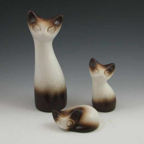 Appraisal: Three Howard Pierce cat figurines The tallest is marked Howard