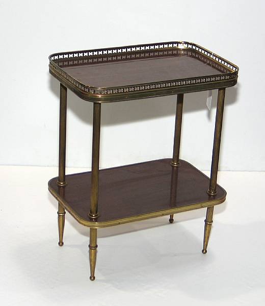 Appraisal: A pair of brass and mahogany tray tables mid th