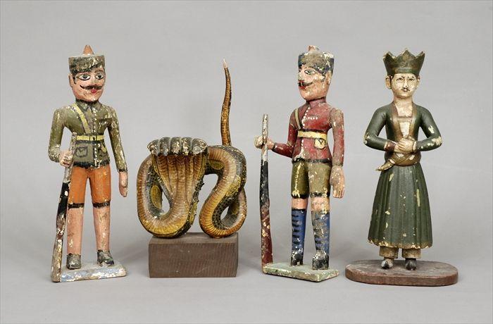 Appraisal: Indian Polychrome Carved Wood Figures of a Prince Two Soldiers