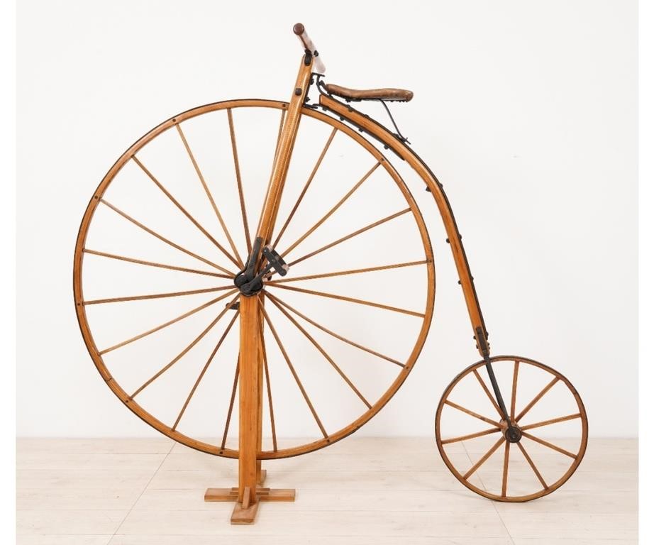 Appraisal: High wheel bicycle wheel with hickory frame with stand blacksmith