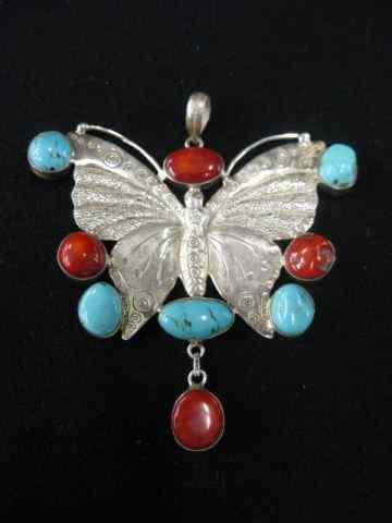 Appraisal: Turquoise Coral Figural Butterfly Pendant rich colors finely engraved -