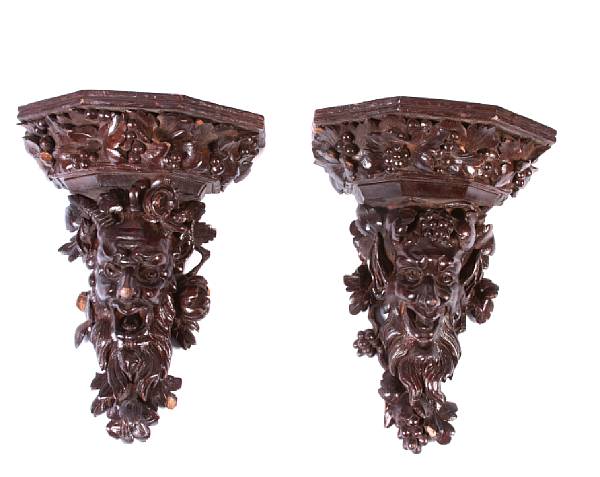 Appraisal: A pair of Continental Baroque style walnut wall brackets late