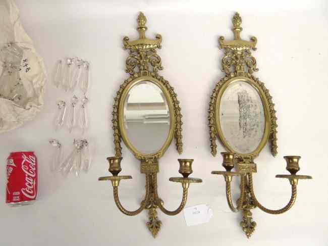 Appraisal: Pair early th c brass sconces with oval beveled mirrors