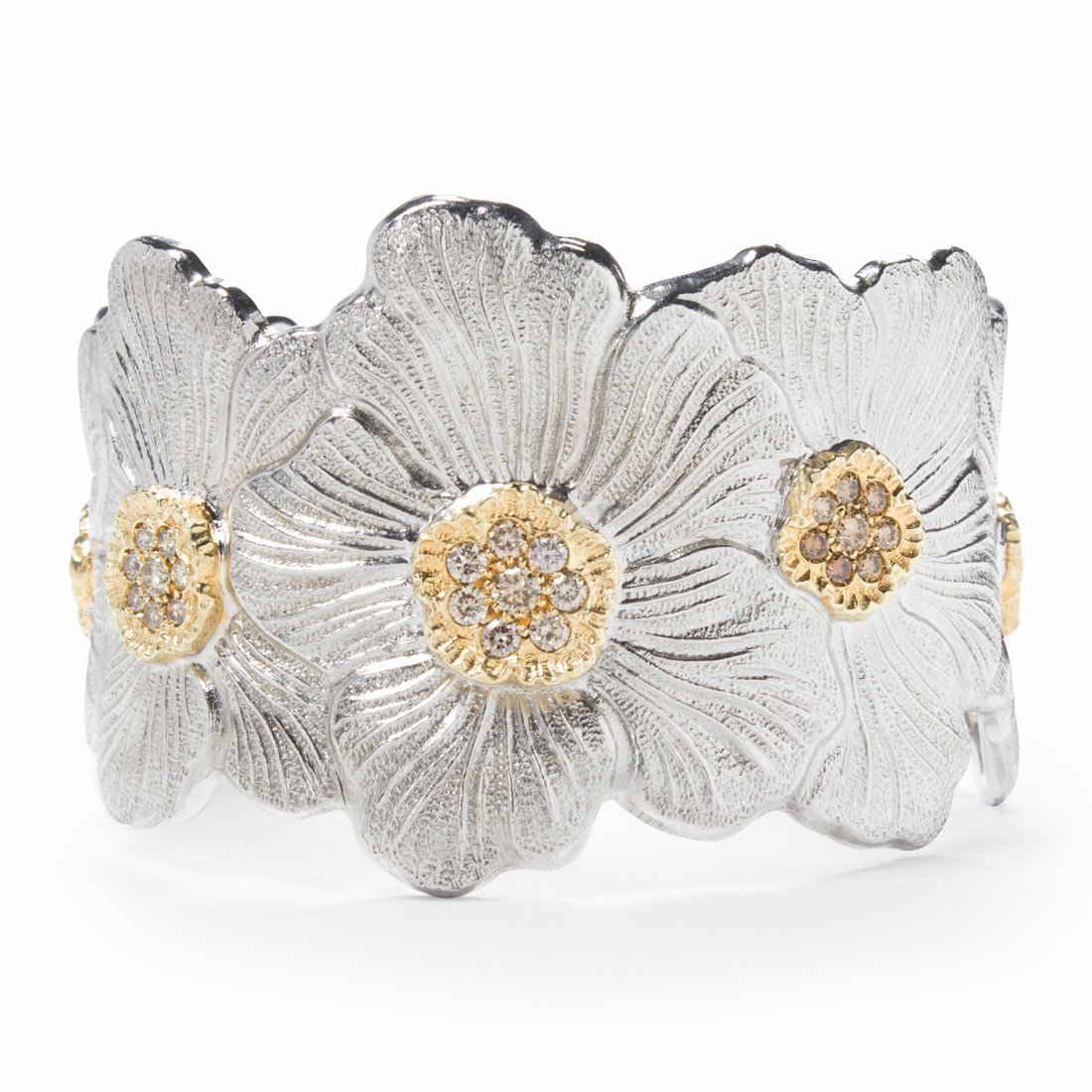 Appraisal: A DIAMOND AND STERLING SILVER BRACELET DAISY BUCCELLATI A diamond