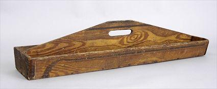 Appraisal: AMERICAN FIGURED WOOD TWO-PART TOOL CARRIER The nailed case with