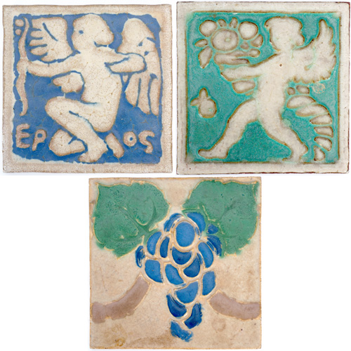 Appraisal: GRUEBY Three tiles two embossed with putti and one with