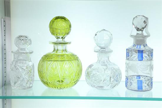 Appraisal: FOUR GLASS COLOGNE BOTTLES Two are cut glass h h