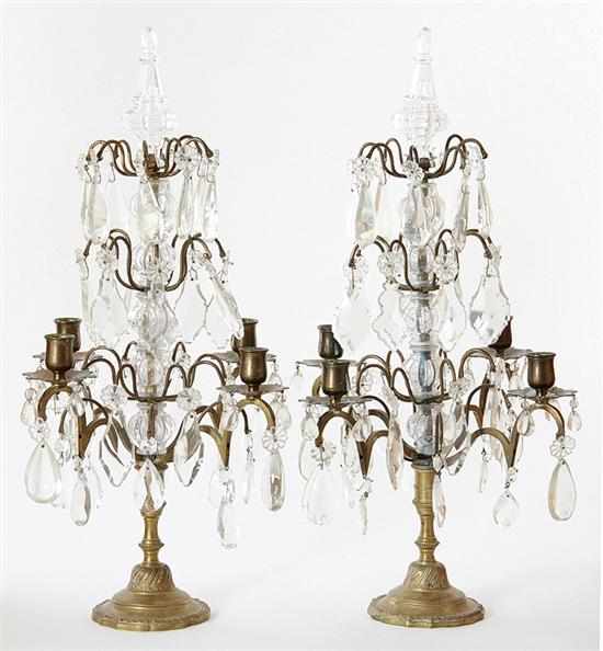 Appraisal: Pair Continental brass and crystal four-light girandoles last quarter th