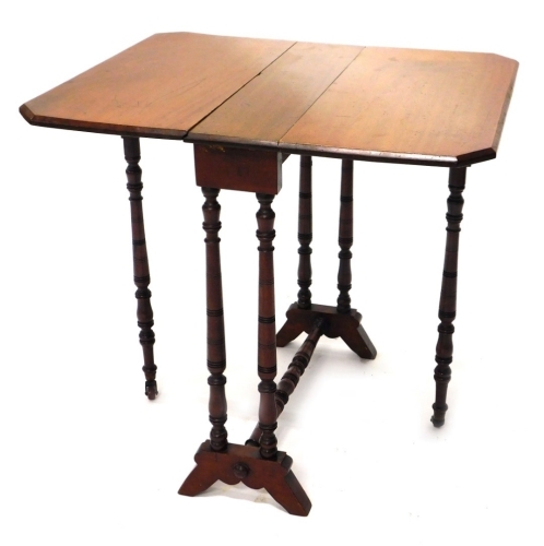 Appraisal: An Edwardian Sutherland table the canted top on turned legs