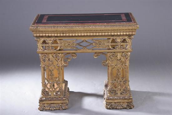 Appraisal: GOTHIC REVIVAL CARVED GILTWOOD CONSOLE th century with associated pietra