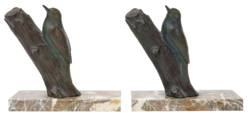 Appraisal: pair Sculptural metal and marble bookends signed in cast after