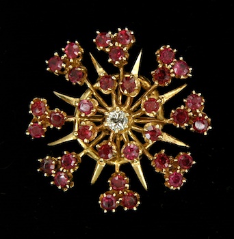 Appraisal: Ladies' Garnet and Diamond Gold Pin yellow gold pin fashioned