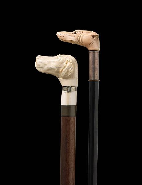 Appraisal: Two ivory handled hound head canes second half th century