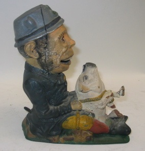 Appraisal: A PAINTED IRON MECHANICAL PIG BANK a 's copy of