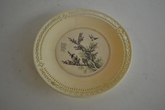 Appraisal: A SMALL RETICULATED CHINESE DISH WITH BIRD DECORATION A F