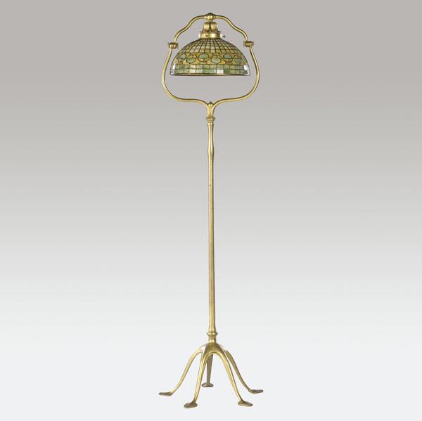 Appraisal: TIFFANY STUDIOS Floor lamp with a green and yellow Favrile