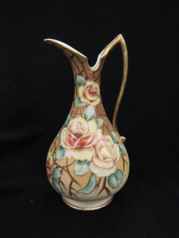 Appraisal: Nippon Handpainted Porcelain Ewer yellow rose decor gold trim satin