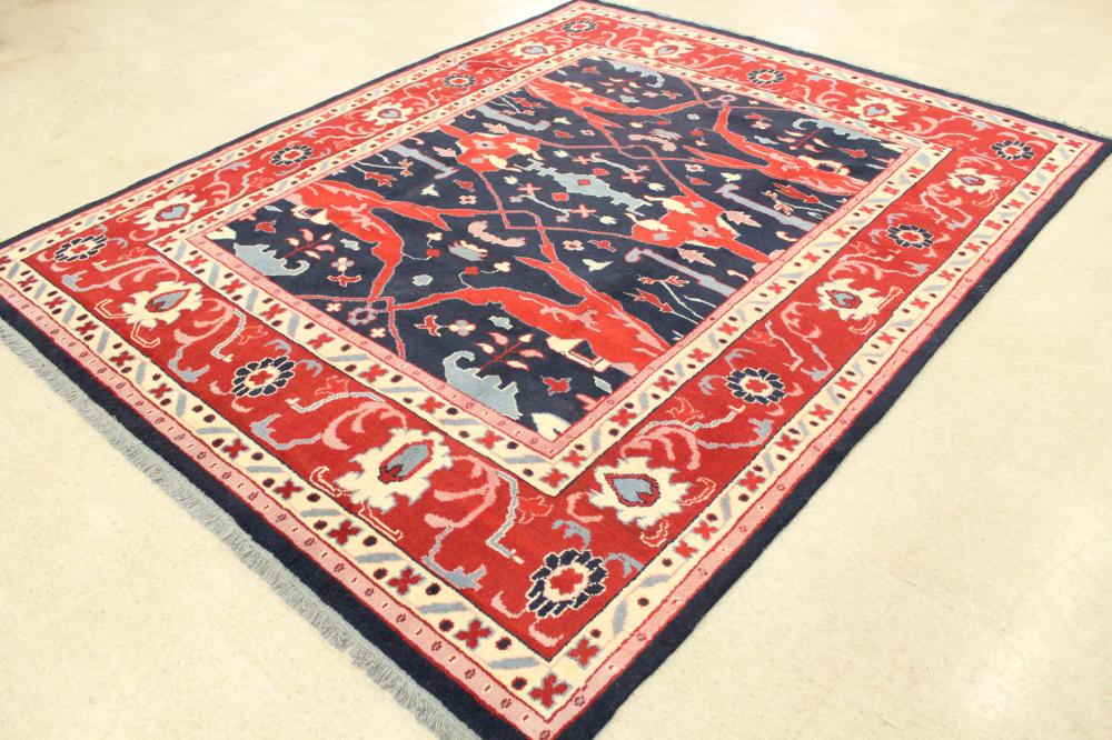 Appraisal: HAND KNOTTED ORIENTAL CARPET Indo-Persian stylized floral and curvilinear design