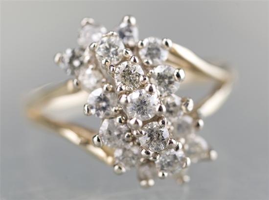 Appraisal: KT yellow gold waterfall diamond cluster ring Ring has rows